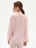 Blusa rosa chiaro con rouche e nastro lavalliere