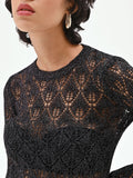 Maglia nera con lavorazione traforata e lurex