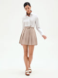 Minigonna a pieghe tortora beige