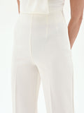 Pantalone a palazzo bianco con piega centrale