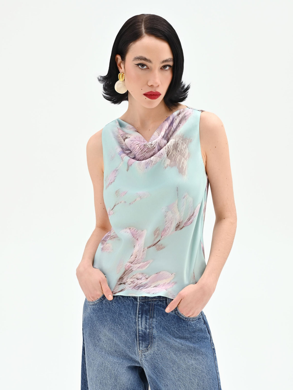 Top verde menta con stampa floreale jacquard
