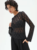 Maglia nera con lavorazione traforata e lurex