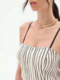 Top in lino panna con fantasia a righe