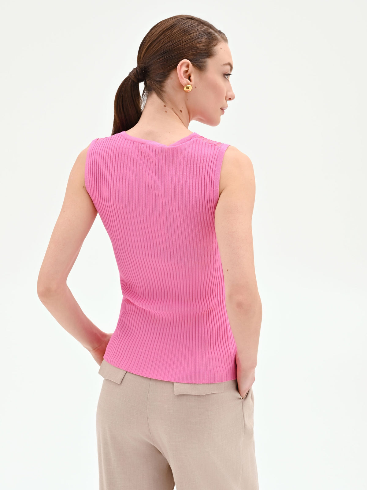 Top rosa in maglia a costine con inserto a righe