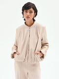 Bomber in similpelle tortora beige con maniche a palloncino