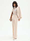 Pantalone a palazzo beige chiaro con risvolto