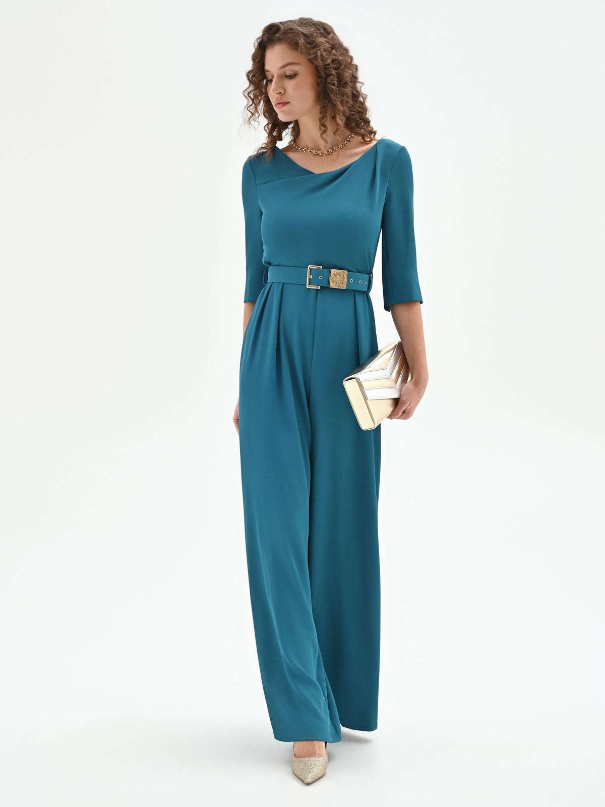 Tuta verde ottanio con scollo drappeggiato