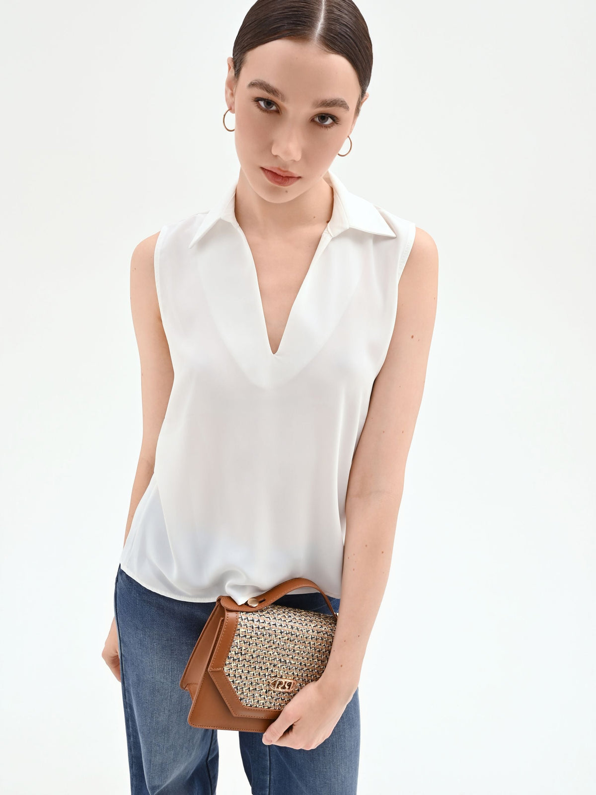 Blusa smanicata bianco panna