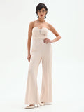 Tuta palazzo beige chiaro con bottoni e bustier
