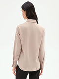 Camicia beige con bottoni ricoperti