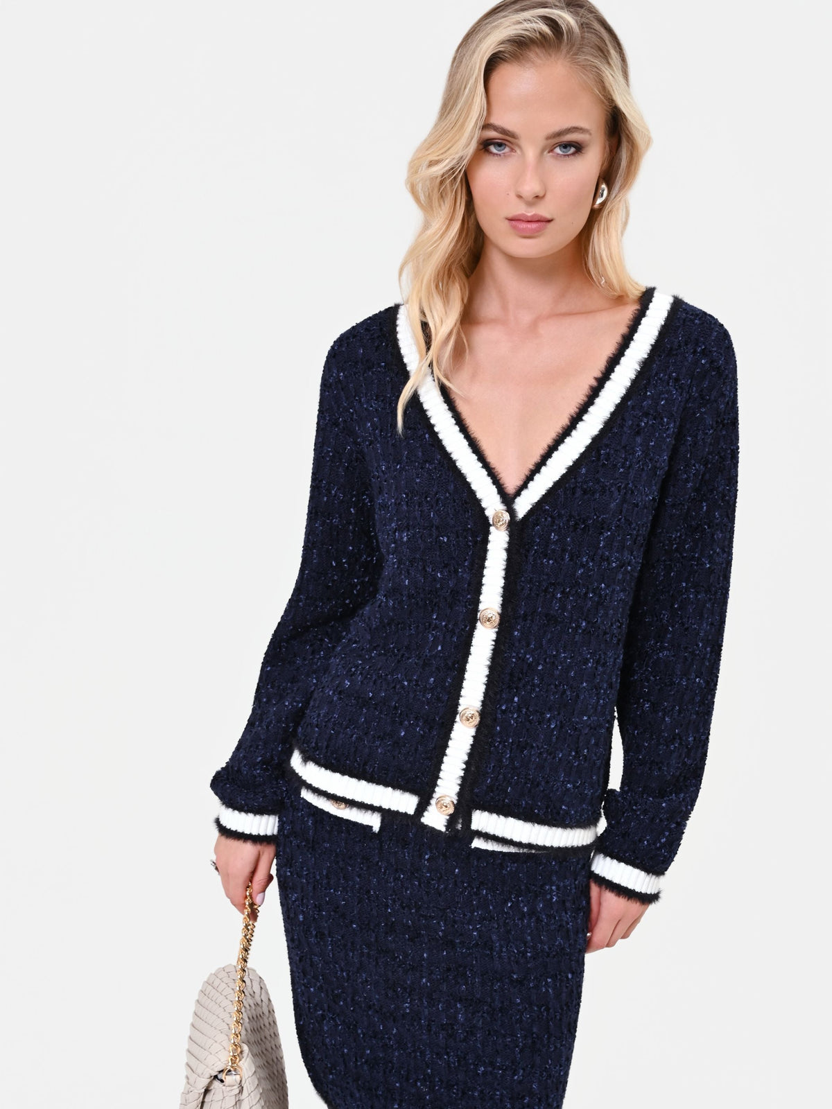 Cardigan in maglia blu navy con profili a contrasto