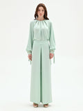 Pantalone palazzo verde menta con spacco frontale