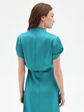 Coprispalla atelier smeraldo verde in raso con maniche strutturate
