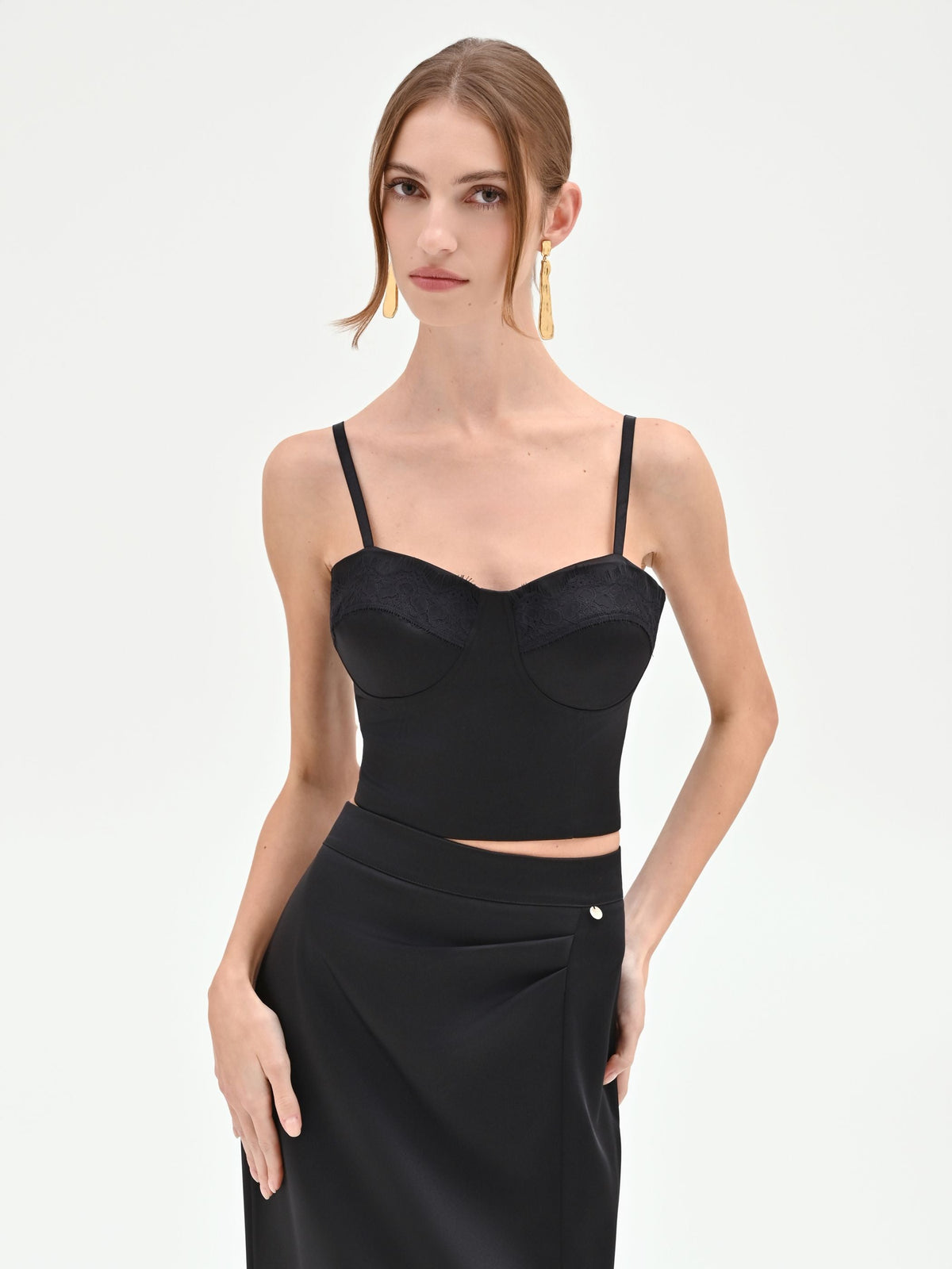 Top bustier nero con profili in pizzo