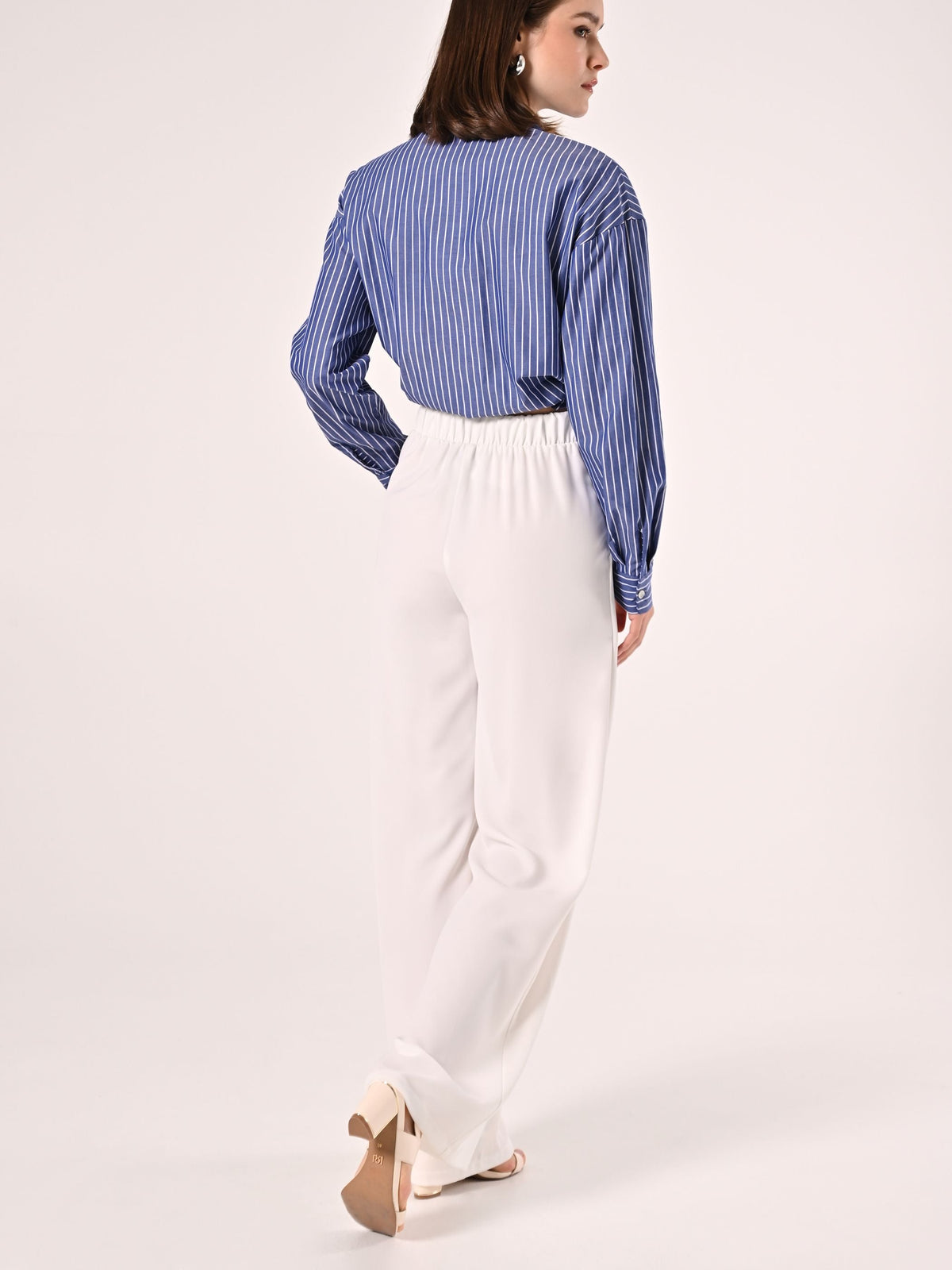 Pantaloni Bianchi in Cadi