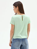 Blusa verde menta in tessuto fluido