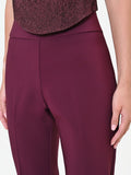 Pantalone svasato bordeaux in tessuto tecnico con fascione in vita