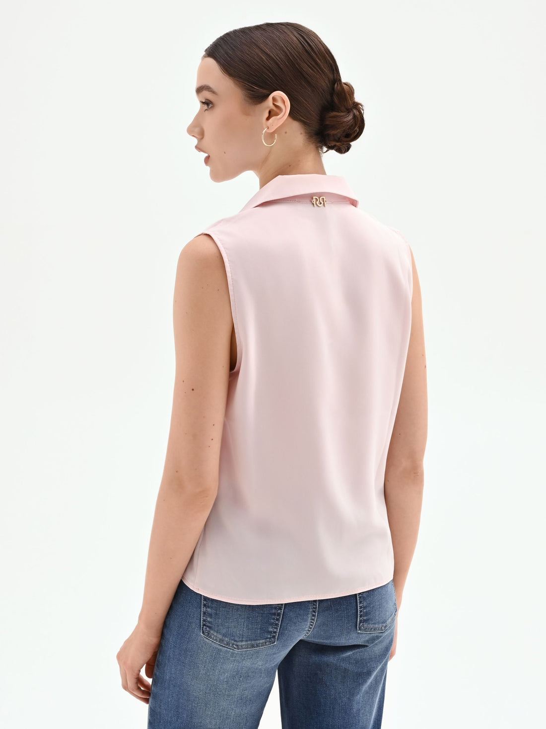 Blusa rosa pastello con collo a rever