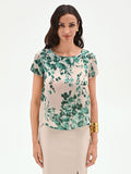 Blusa verde con stampa floreale all-over