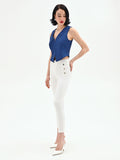 Jeans bianchi skinny con bottoni laterali