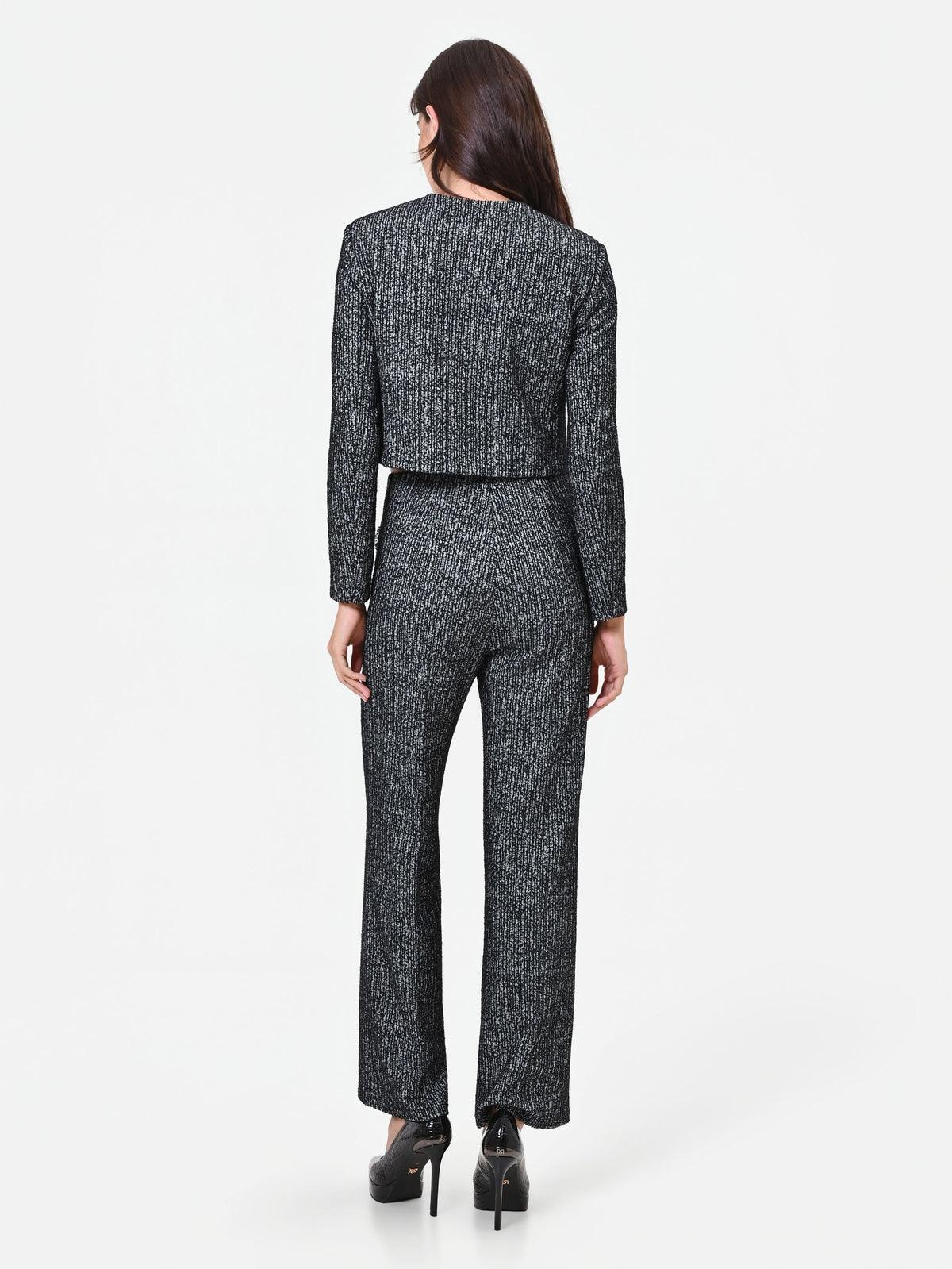 Pantalone nero in bouclé con tasche a toppa
