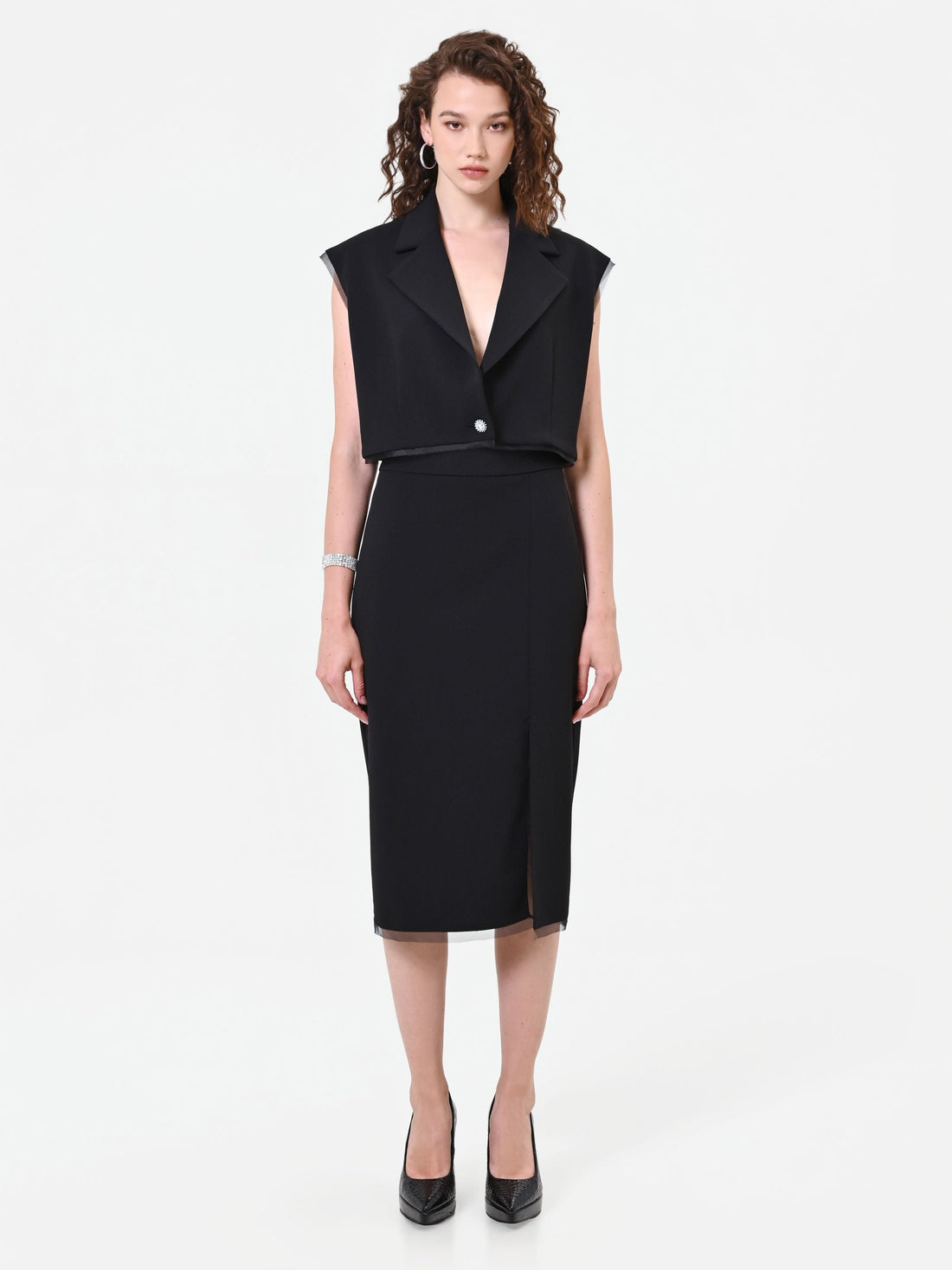 Gilet nero cropped con dettagli velati