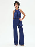 Tuta elegante blu brillante con drappeggio laterale