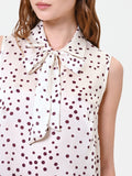 Top in raso con stampa a pois bordeaux
