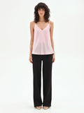 Top in raso rosa pastello con scollo a v