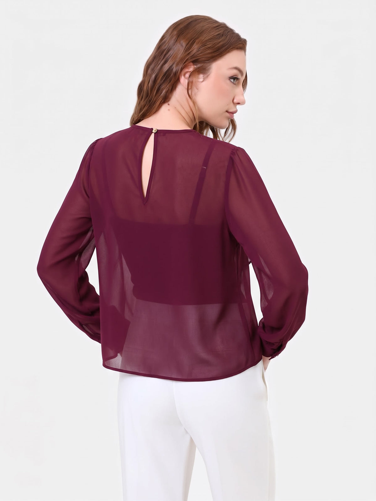 Blusa bordeaux con volant asimmetrico
