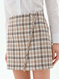 Gonna corta cioccolato a portafoglio in tweed
