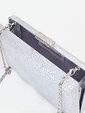 Borsa clutch argento con applicazione gioiello