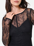 Blusa nera in pizzo con fodera a cuore