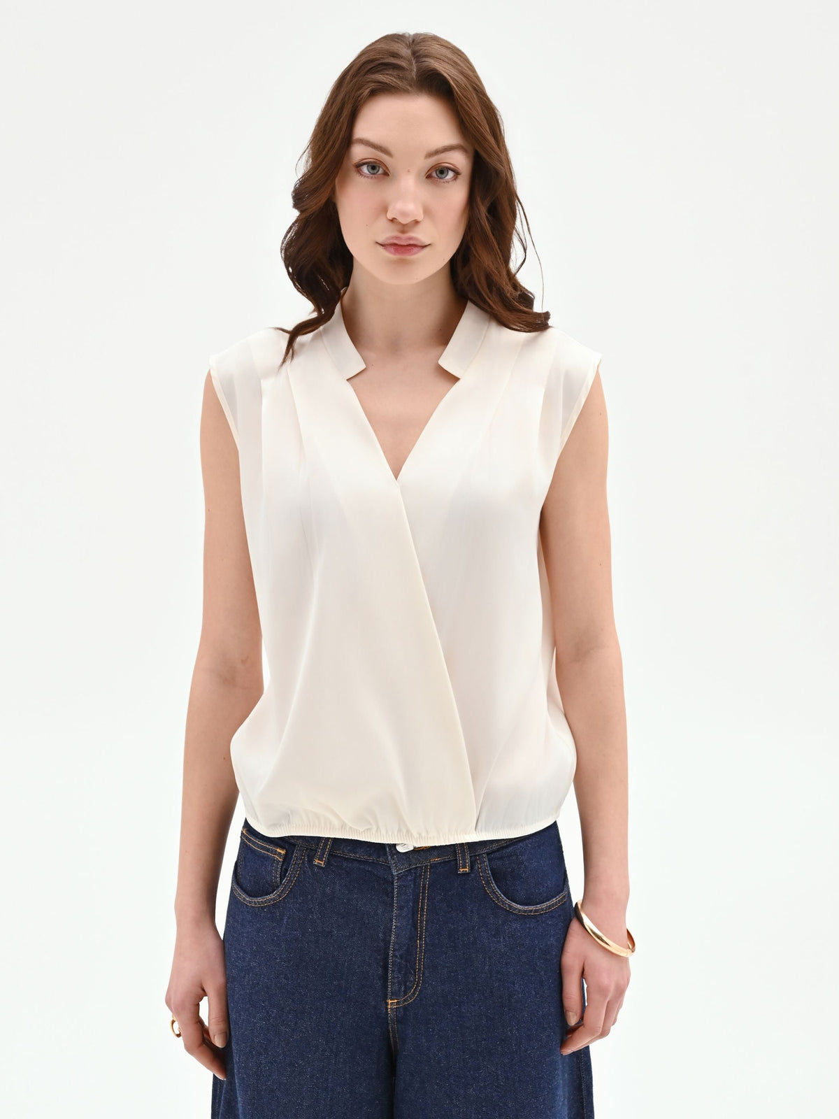 Top panna bianco in tweed stile gilet