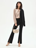 Pantalone nero flared con spacco frontale