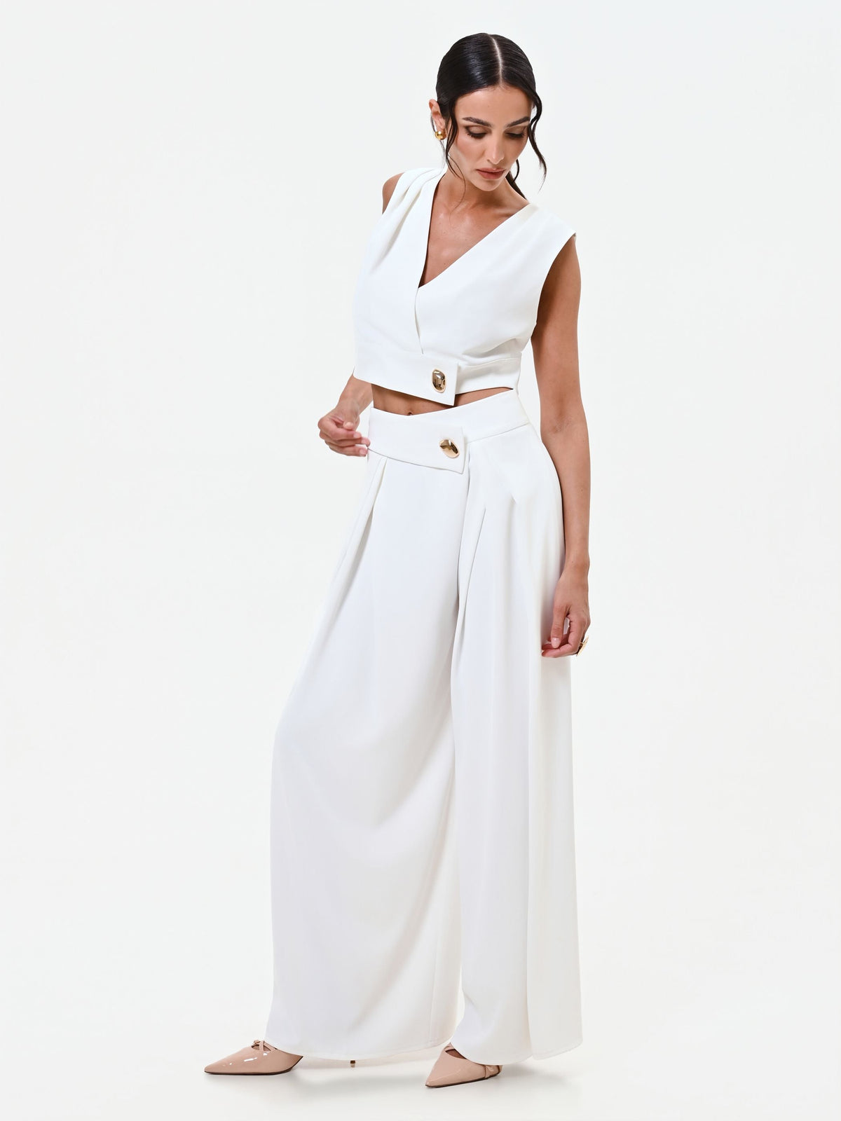 Pantalone palazzo bianco con bottone design