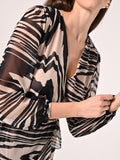 Abito Animalier con Rouche