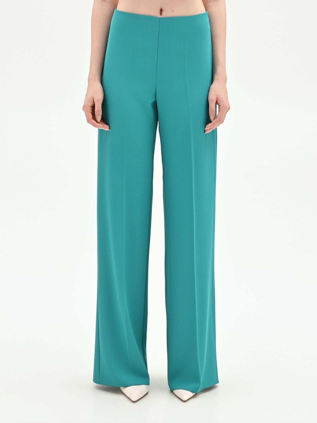 Pantalone palazzo turchese azzurro dalla linea fluida