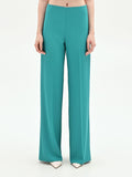 Pantalone palazzo turchese azzurro dalla linea fluida