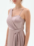 Abito lungo atelier rosa blush con drappeggio