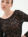 Blusa nera in pizzo floreale