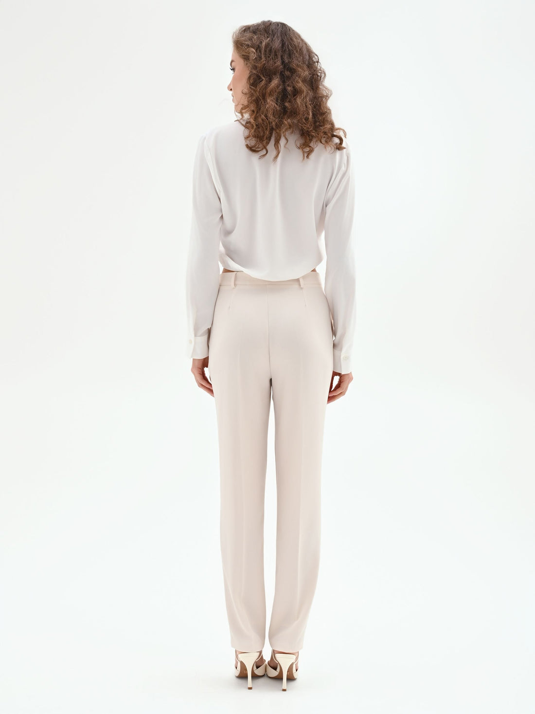 Pantaloni slim bianchi in tessuto fluido mano Crepe