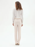 Pantaloni slim bianchi in tessuto fluido mano Crepe