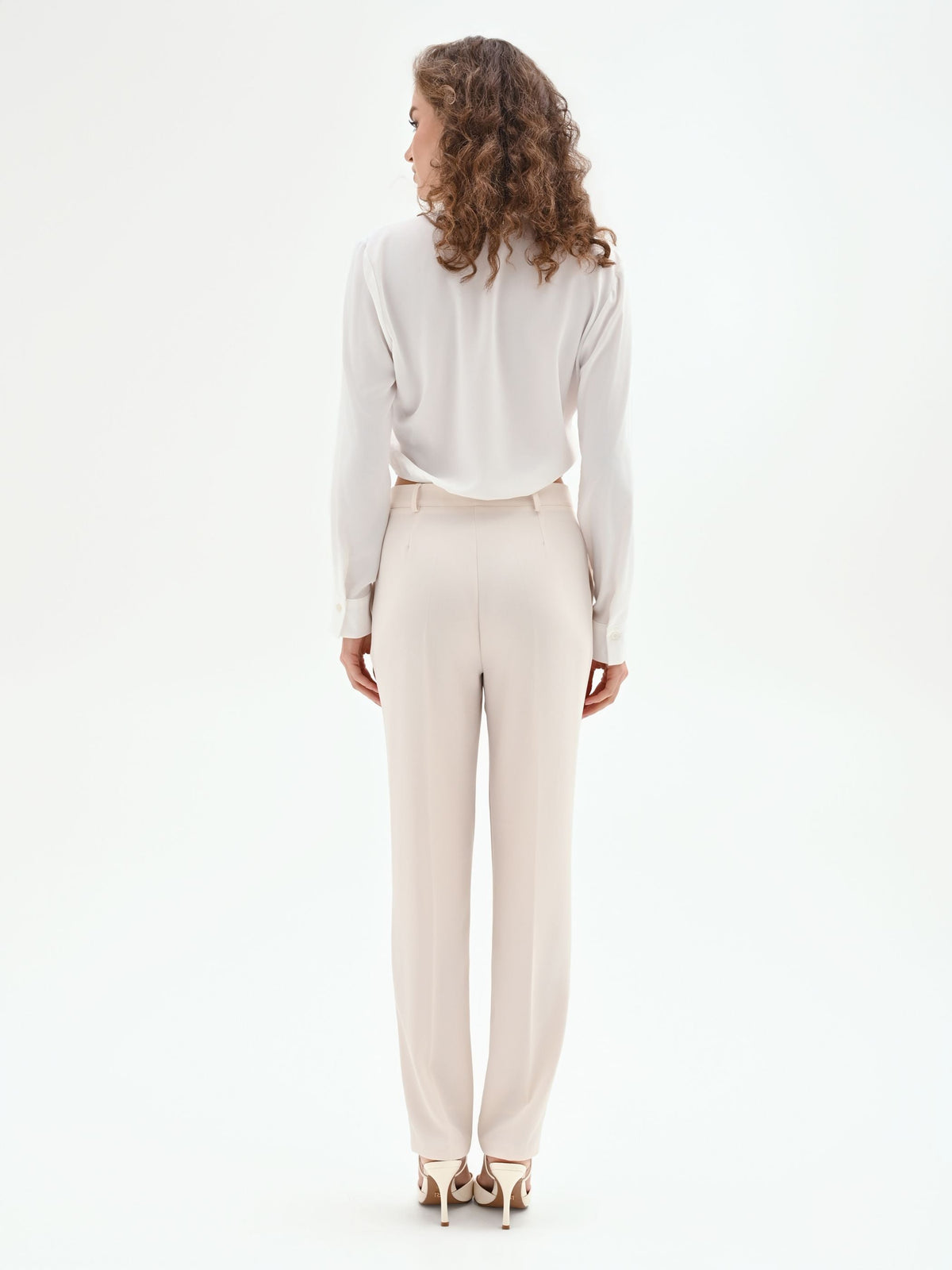 Pantaloni slim bianchi in tessuto fluido mano Crepe