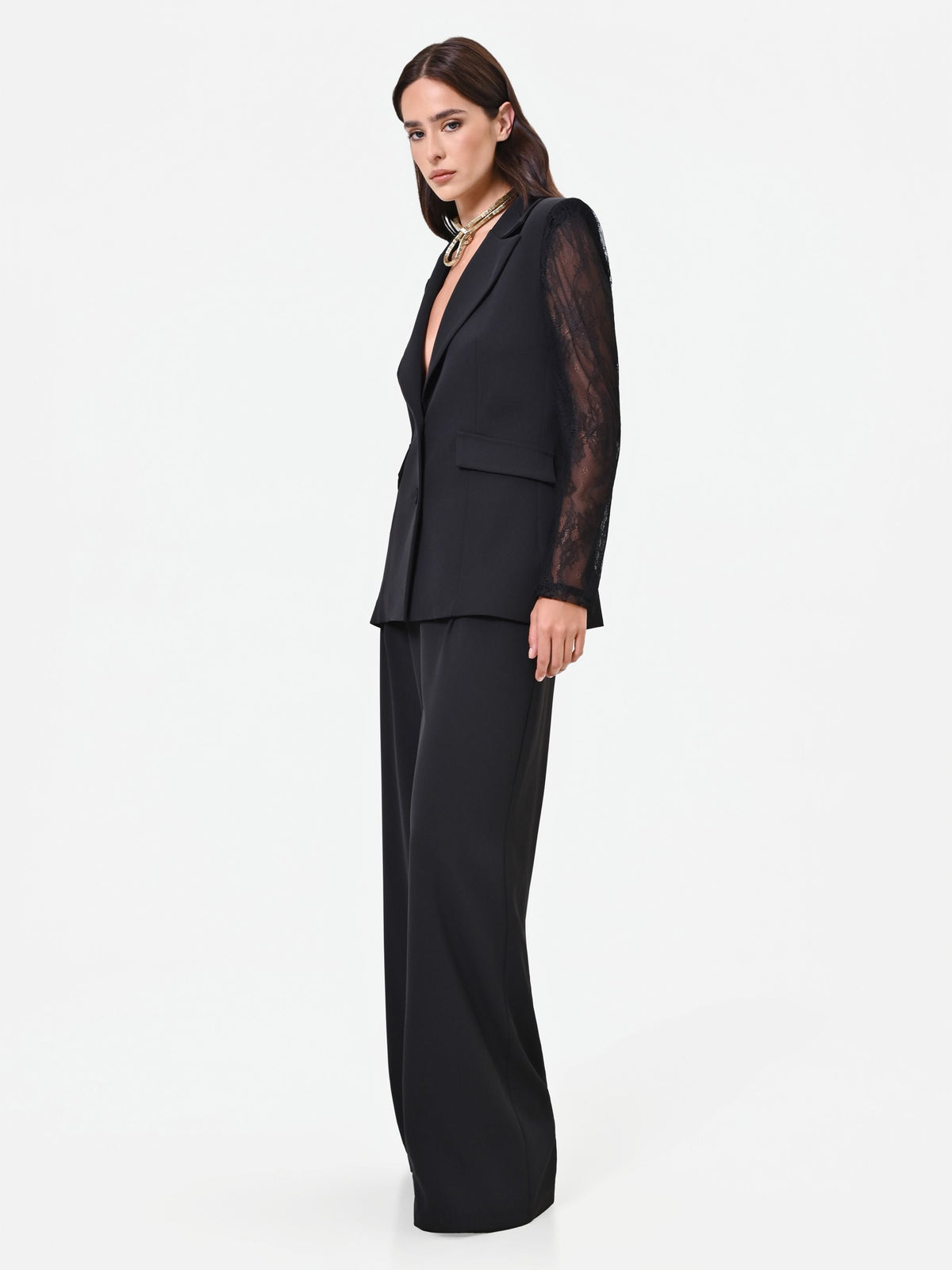 Pantalone palazzo nero con fascia in pizzo
