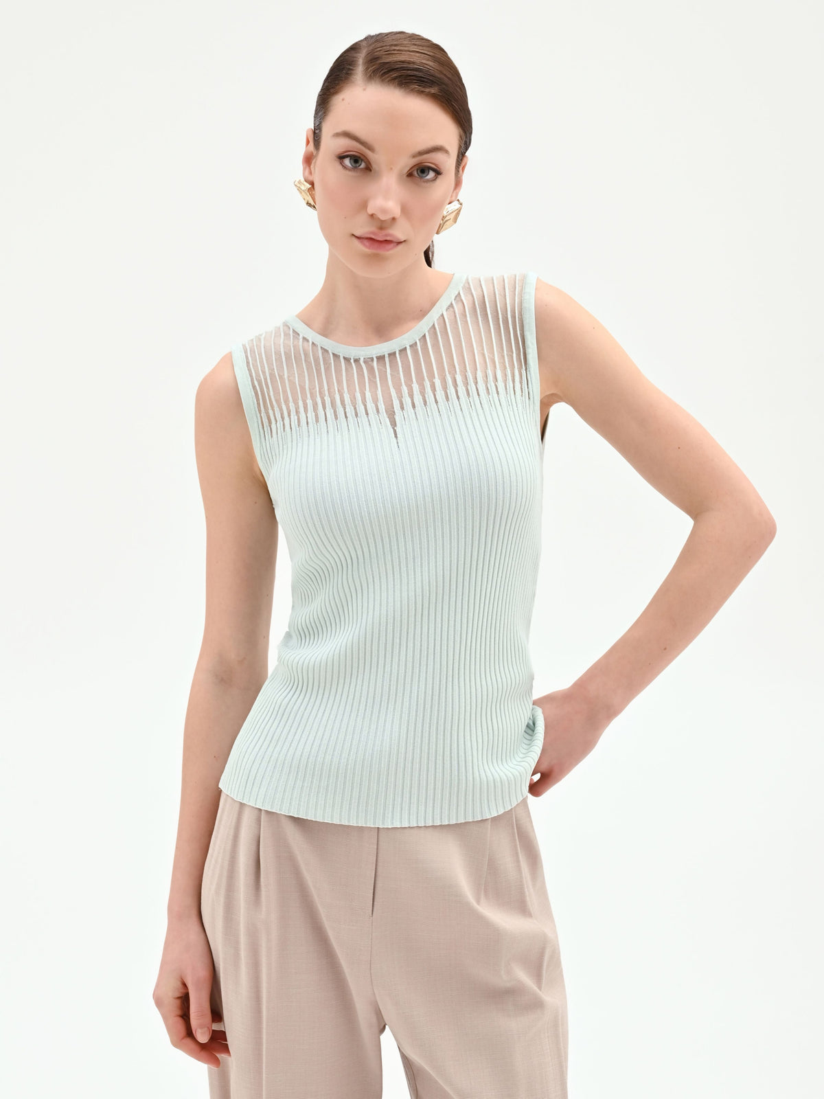 Top verde menta in maglia a costine