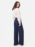 Pantalone a palazzo blu navy con piega stirata