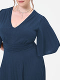 Abito Curvy blu navy plissettato con micro-glitter