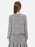 Giacca cropped grigia effetto bouclé