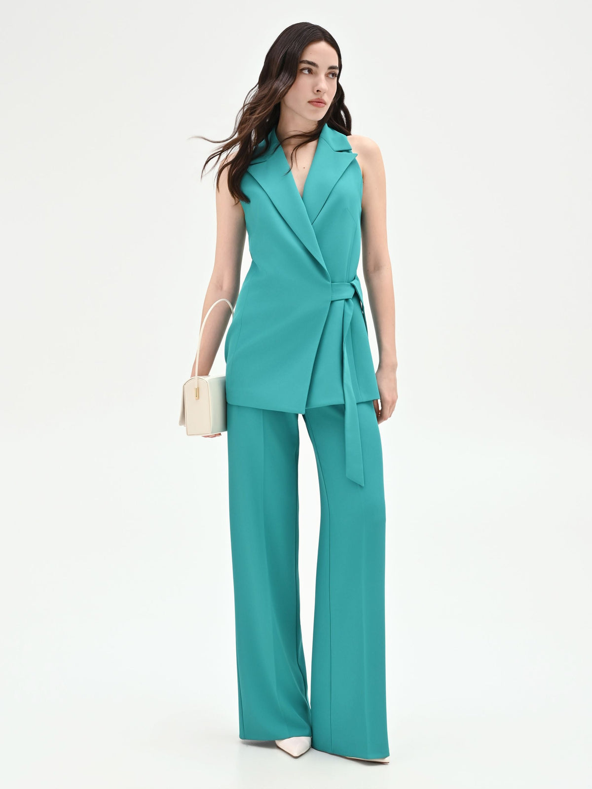 Pantalone palazzo turchese azzurro dalla linea fluida